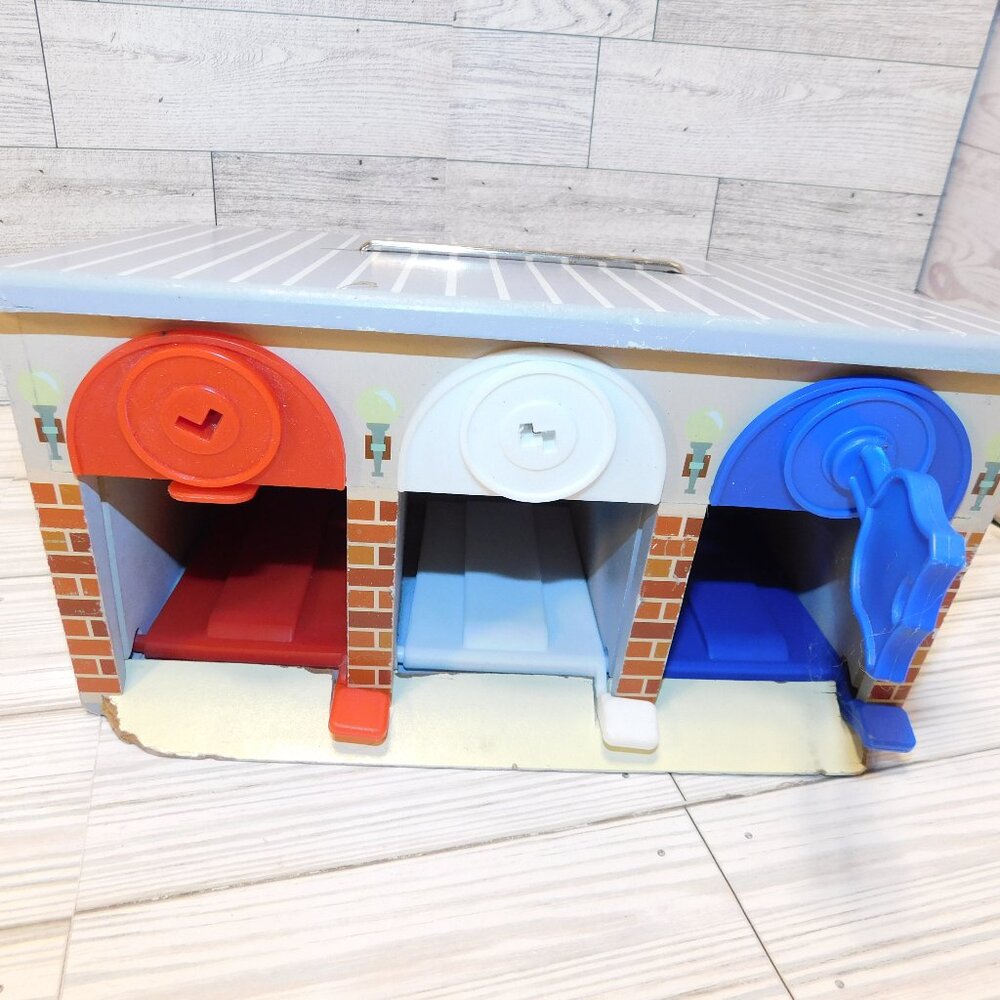 Melissa & Doug Lock and Roll Rescue Garage - 3 Wooden Vehicles Garage W 1 Lock *
